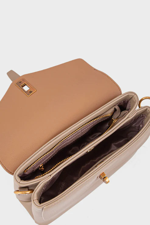 Tan handbag with gold accents on a white background