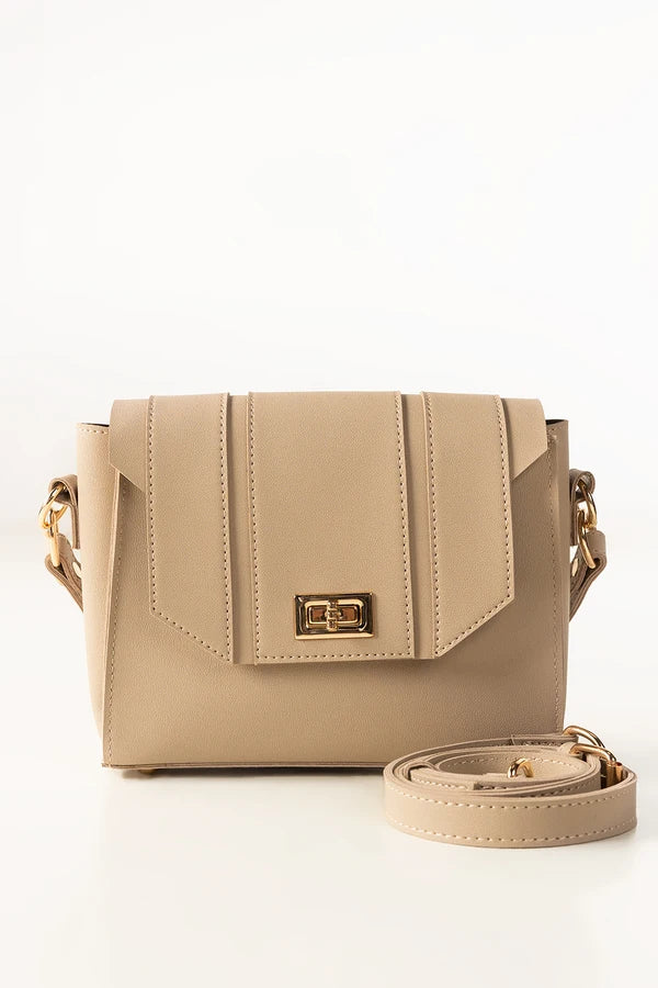 Beige handbag with a strap on a white background