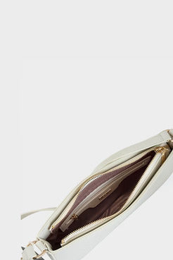 White handbag with open zipper on a white background