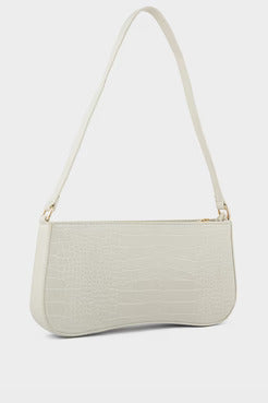 Beige handbag with a strap on a white background