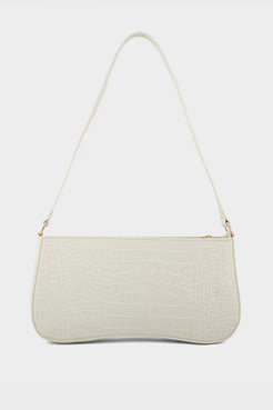 Beige handbag with a strap on a white background