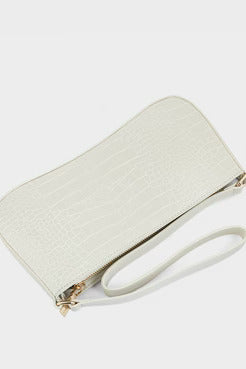 White clutch bag with a gold zipper on a light gray background