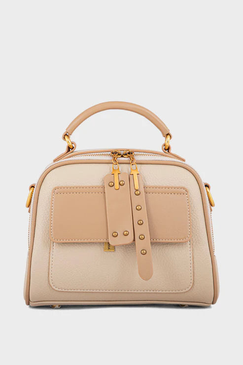 Beige handbag with gold accents on a light gray background