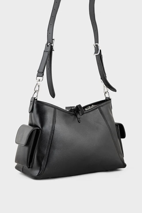 Black handbag with a shoulder strap on a white background