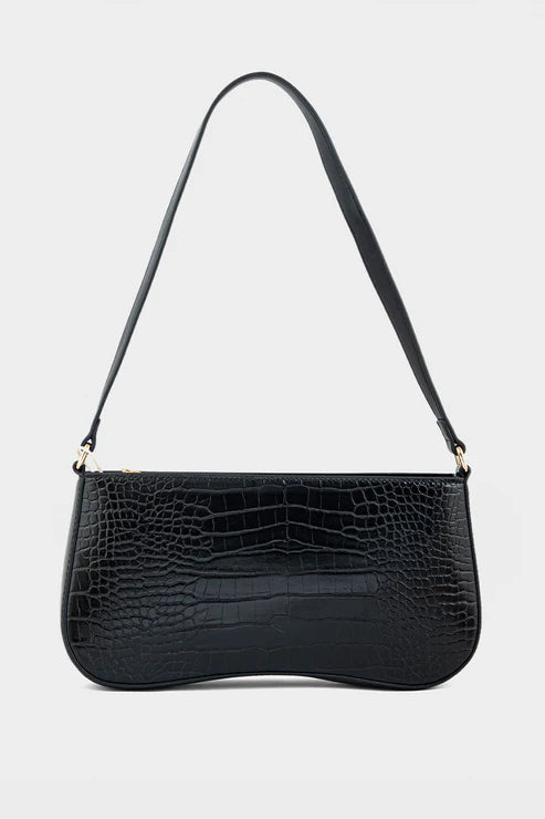 Black crocodile-patterned handbag on a light gray background