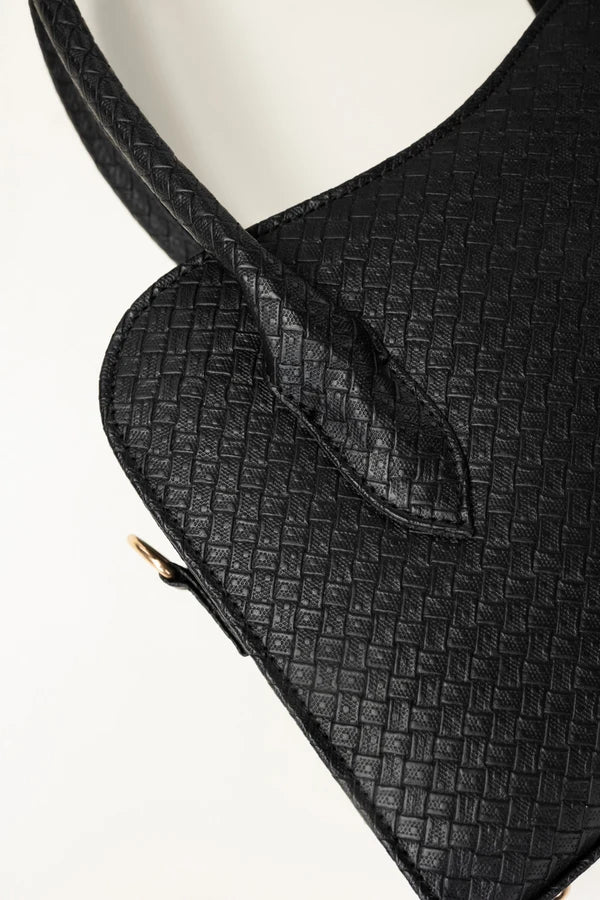 Black textured handbag on a white background