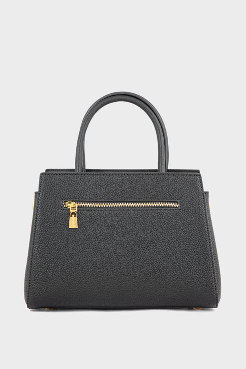 Black handbag with a gold zipper on a light gray background