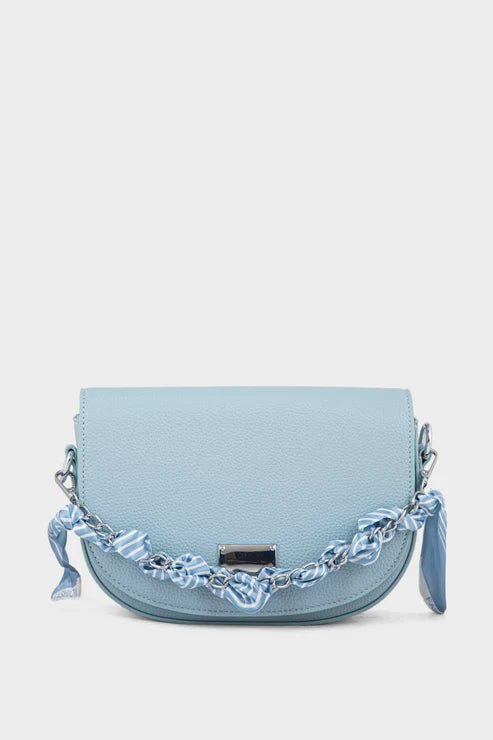 Light blue handbag with chain detail on a white background