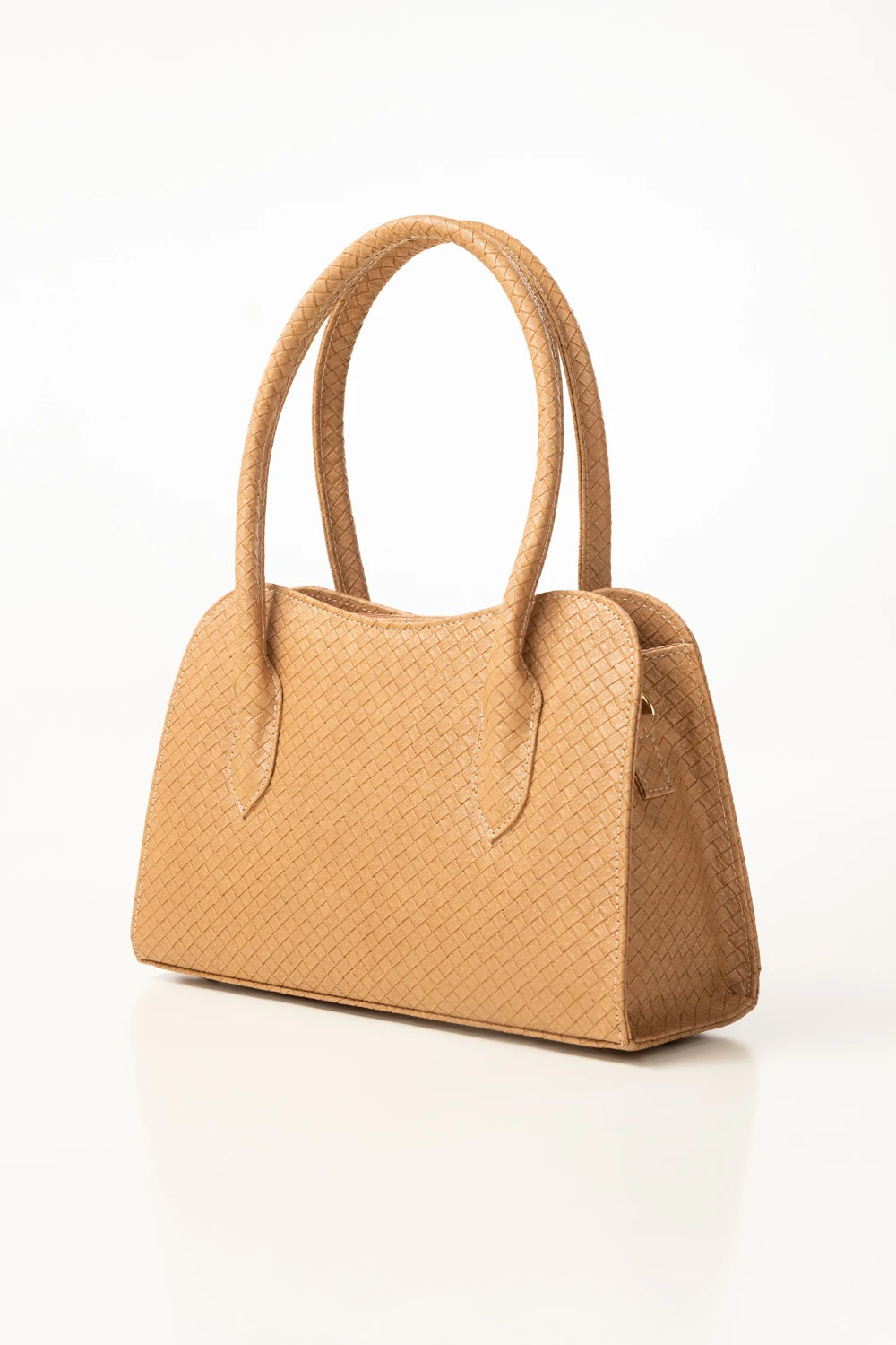 Tan woven handbag on a white background