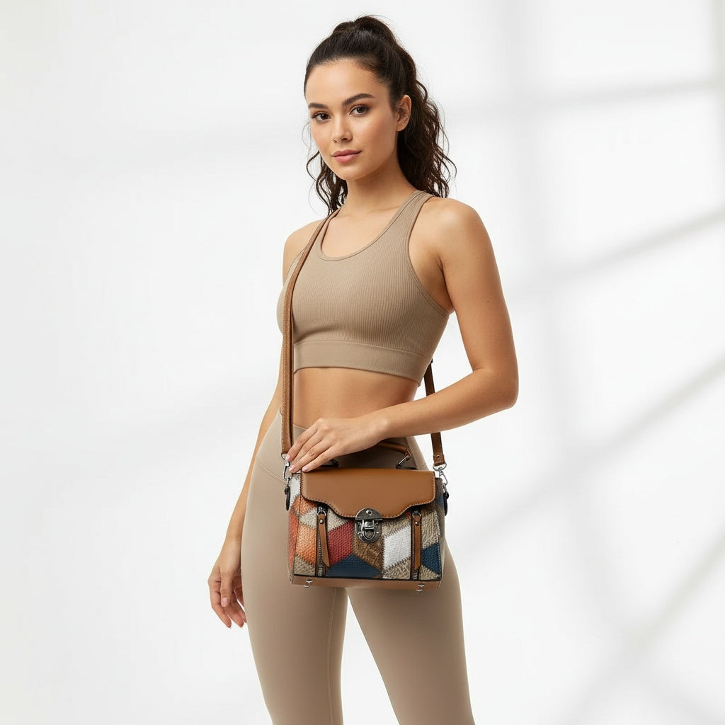 Woman holding a patterned handbag against a white background