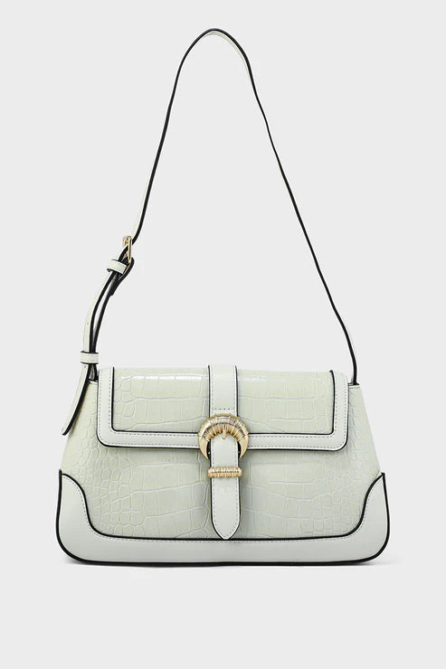 Light green handbag with a gold buckle on a white background