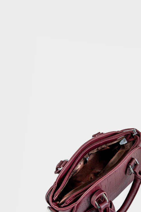 Red handbag on a light gray background