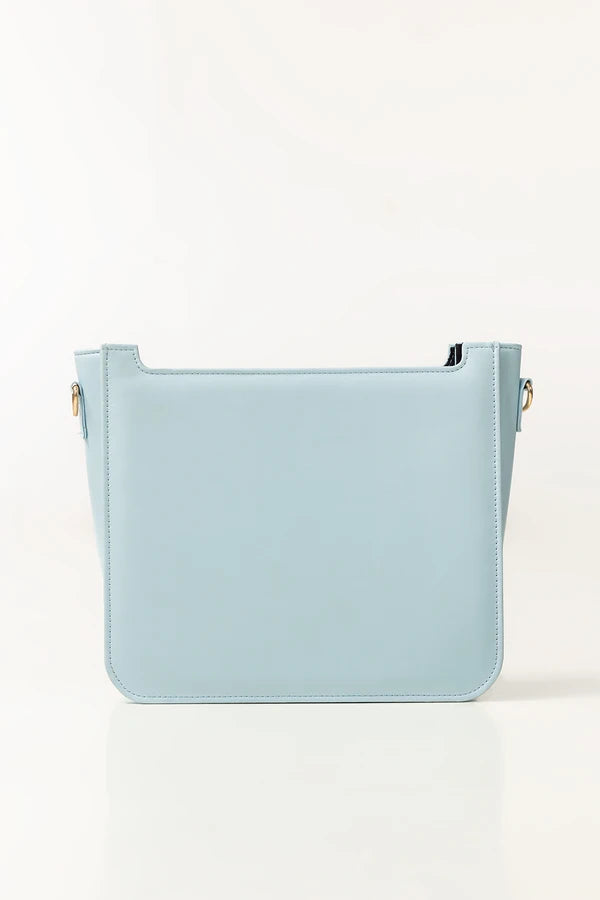 Light blue handbag on a white background