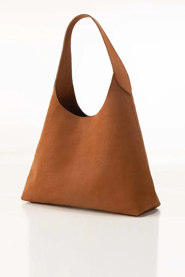 Brown leather handbag on a white background