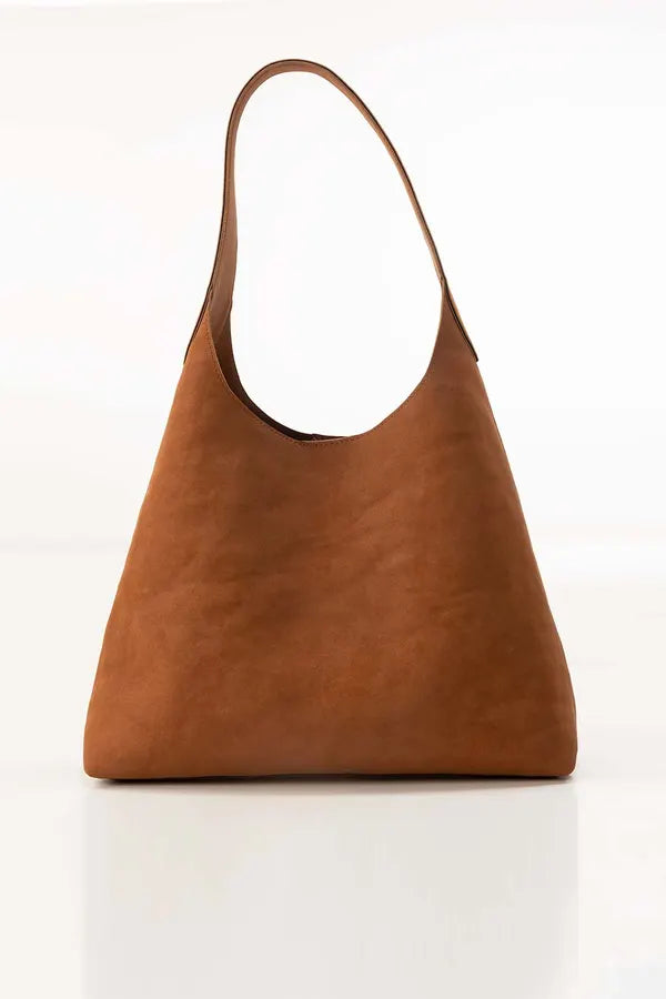 Brown leather handbag on a white background