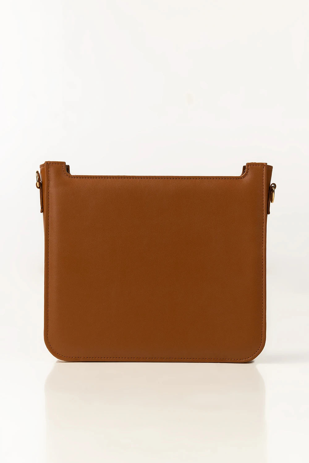 Brown leather handbag on a white background