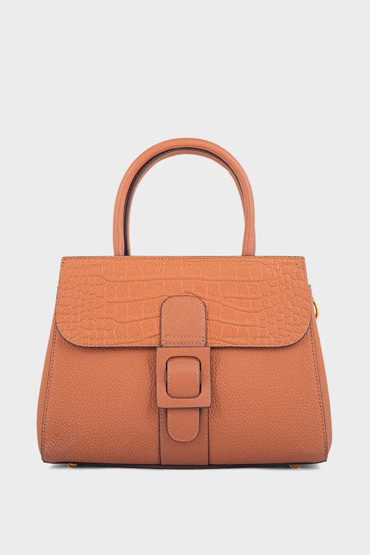 Brown handbag with a buckle on a light gray background