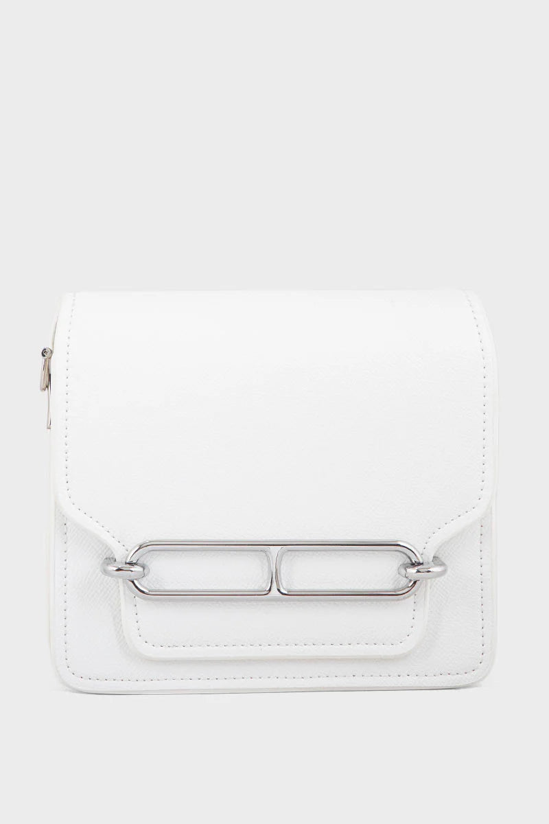 White handbag with a silver rectangular clasp on a white background