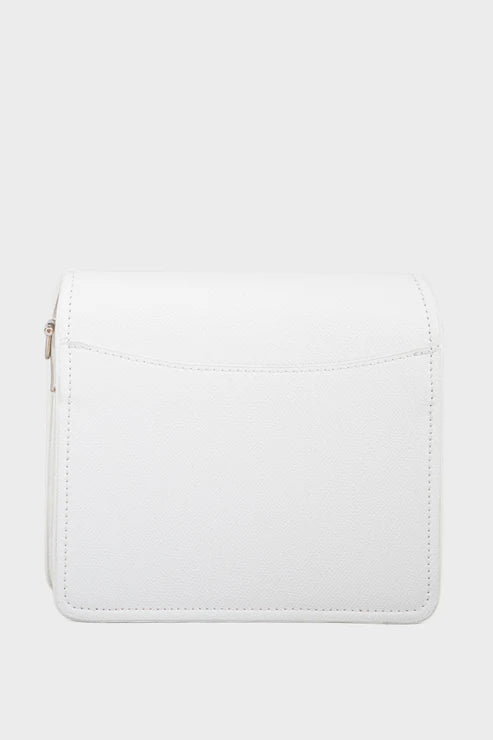 White leather wallet on a light gray background